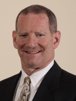 Gary Besnier wearing a black suit